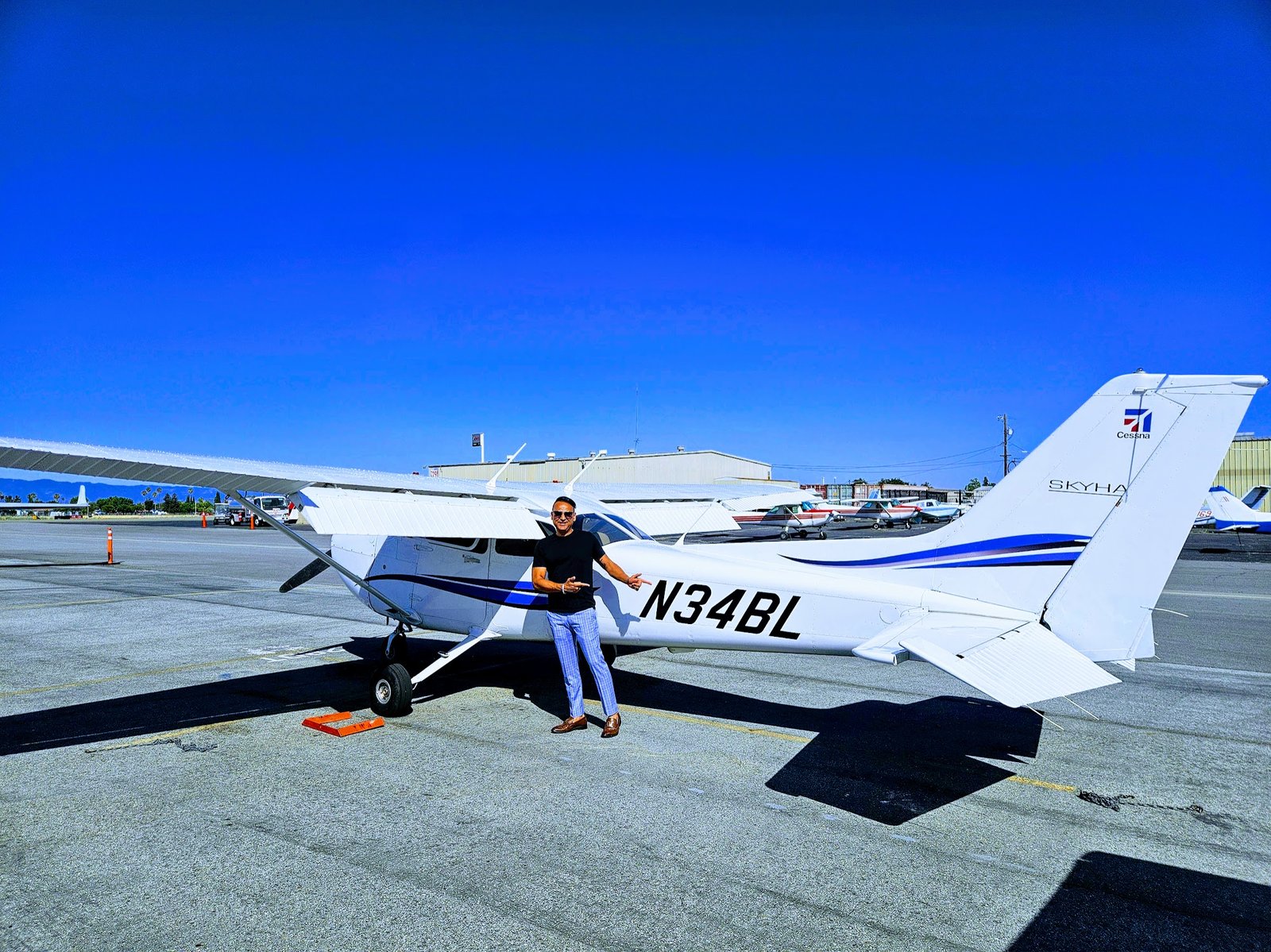 Vagish Kapila beside Cessna after solo flight